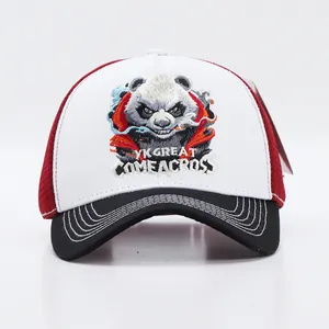 Detailed view of panda embroidery and contrast mesh on a trucker baseball cap