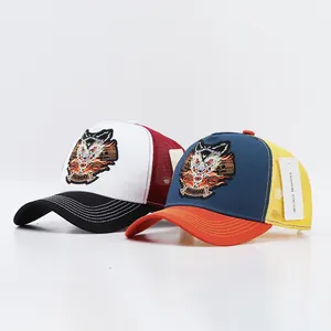 Wolf head embroidery trucker hats with mesh back in black, blue and orange colors