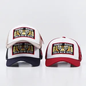 Detailed embroidery of tiger head patches on breathable mesh trucker baseball caps
