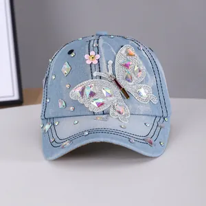 Casquette de baseball en jean bleu avec papillon en strass et petite fleur 3D
