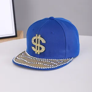 Detail of blue hip hop flat brim cap with rhinestone dollar sign and glitter visor