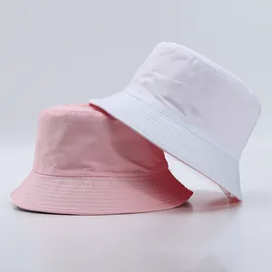 Detail showing high-quality stitching on pink and white cotton canvas bucket hats