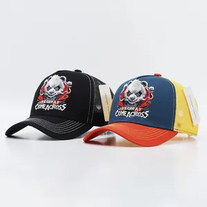 Embroidered panda trucker hats in black and multi-color mesh with YK GREAT lettering