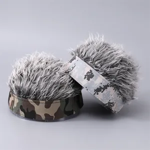 Detail of camouflage visor caps with grey synthetic hair wig and durable brim