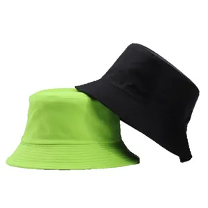 Minimalist cotton bucket hats in neon green and black colors for summer sun protection