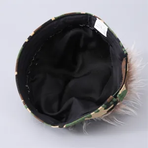 Detail of woodland camouflage wig hat featuring 100% cotton lining and brown synthetic hair