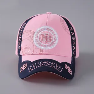 Detailed close-up of pink and navy baseball cap featuring Hamburg and Nassau embroidery