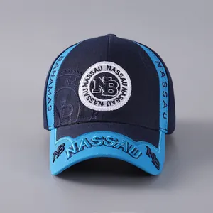 Detailed close-up of Nassau Bahamas embroidery on a navy and light blue baseball cap