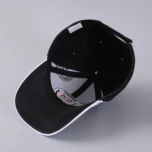 Detail view of the baseball cap interior showing 100% acrylic fabric and wash care label