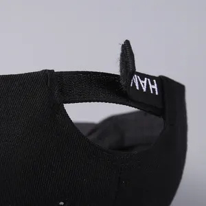 Detail view of the black Hamburg baseball cap showing the adjustable velcro strap and embroidery