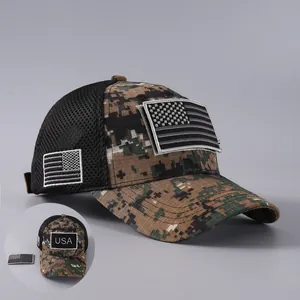 Macro detail of breathable mesh and camo fabric with Velcro USA patches on tactical hat