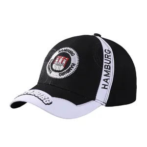 Black and white Hamburg embroidery baseball cap with city crest and color block design