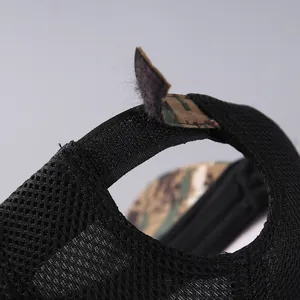 Detail of breathable black mesh and adjustable camo velcro strap on tactical baseball cap