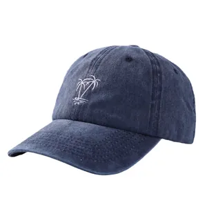 Classic navy blue washed cotton baseball cap featuring white palm tree embroidery