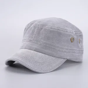 Detail view of washed grey cotton cadet cap showing metal eyelets and reinforced stitching
