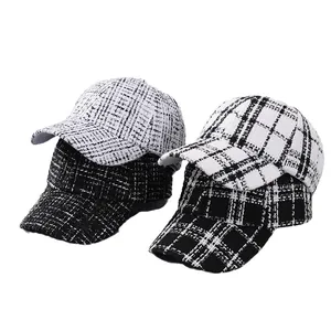 Classic houndstooth tweed baseball caps in black and white vintage style for women