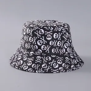 Black bucket hat with white skull and crossbones print in high-quality twill cotton