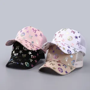 Detail of four colorful mesh baseball caps with shiny laser printed patterns and letters