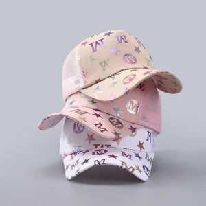 Detailed macro view of colorful metallic letters on mesh trucker hats in various colors