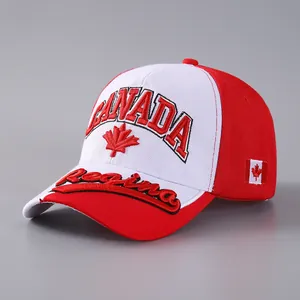Close-up of red and white baseball cap with 3D embroidery of Canada maple leaf and flag