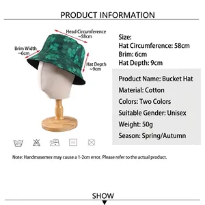 Reversible cotton bucket hat with green clover print for sun protection in spring