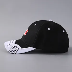 Detailed side view of black baseball cap with white CANADA embroidery and maple leaf logo