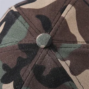 Close-up of camo baseball cap showing reinforced stitching and premium twill fabric