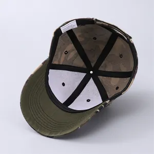 Detail view of camouflage baseball cap interior with 100% acrylic care label and stitching