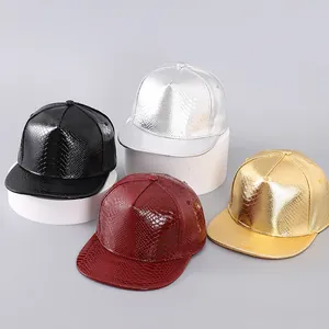 Macro display of faux leather flat brim hats with snakeskin texture and metallic finish