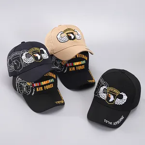 Detail of embroidered military baseball caps with Airborne and Air Force 3D patches