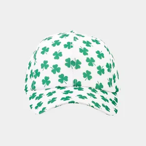 White baseball cap with green lucky clover shamrock prints and curved brim