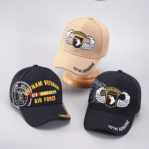 Detail of embroidered 101st Airborne and Vietnam Veteran baseball caps with 3D letters