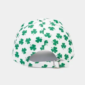 Back view of white baseball cap with green clover print and silver adjustable buckle