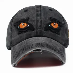 Vintage dark grey washed cotton baseball cap with eagle eye embroidery and distressed brim