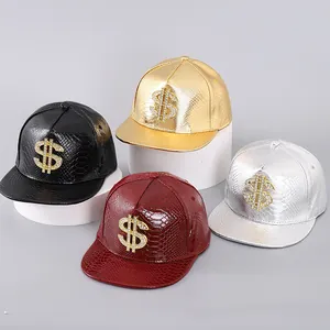 Detail of hip-hop flat brim caps with snakeskin texture and rhinestone dollar sign