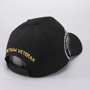 Black baseball cap with gold Vietnam Veteran embroidery and side military patch