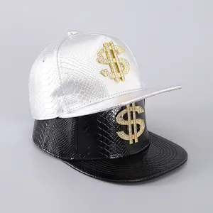 Detail of snake skin texture PU leather snapback hats with rhinestone dollar symbol
