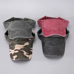 Flat lay view of four washed denim sun visors in army green, brick red, camo and grey