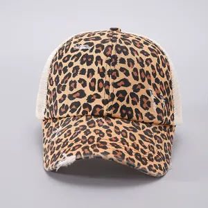 Close-up of leopard print mesh trucker hat with distressed details and ponytail hole
