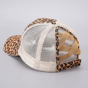 Detail of leopard print baseball cap with criss-cross elastic bands for ponytail