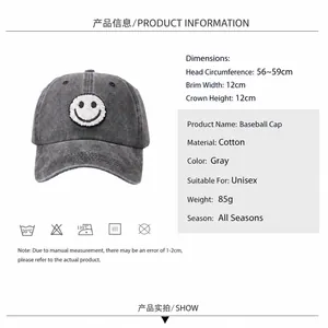 Grey cotton denim baseball cap with smiley face patch and detailed sizing measurements