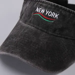Detailed embroidery of NEW YORK text on washed cotton grey sun visor hat for summer