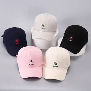 Detailed close-up showing five color variants of cotton baseball caps with embroidered patches