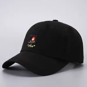 Minimalist black cotton baseball cap featuring fire embroidery and front patch design