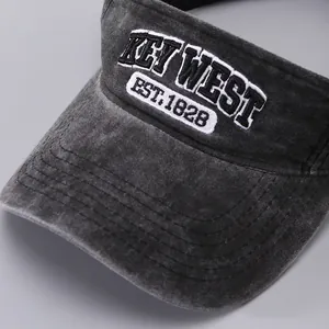Detail of Key West 3D embroidery on washed gray sun visor with reinforced stitching