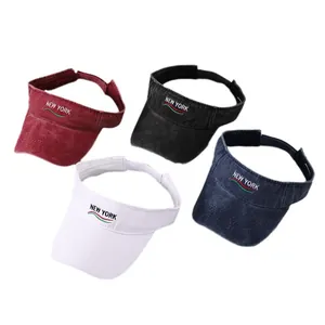 Set of four embroidered New York sun visors in burgundy, black, white and navy blue