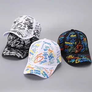 Detail of street-style graffiti baseball caps with inspirational typography and prints