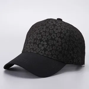 Elegant black floral baseball cap with textured pattern and curved brim for women