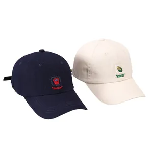 Minimalist cotton baseball caps in navy and cream with bucket and corn embroidery