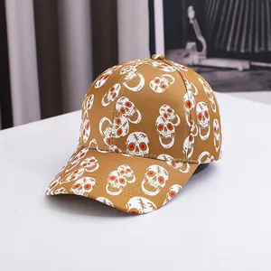 Halloween baseball cap in tan with all-over skull print and curved brim style